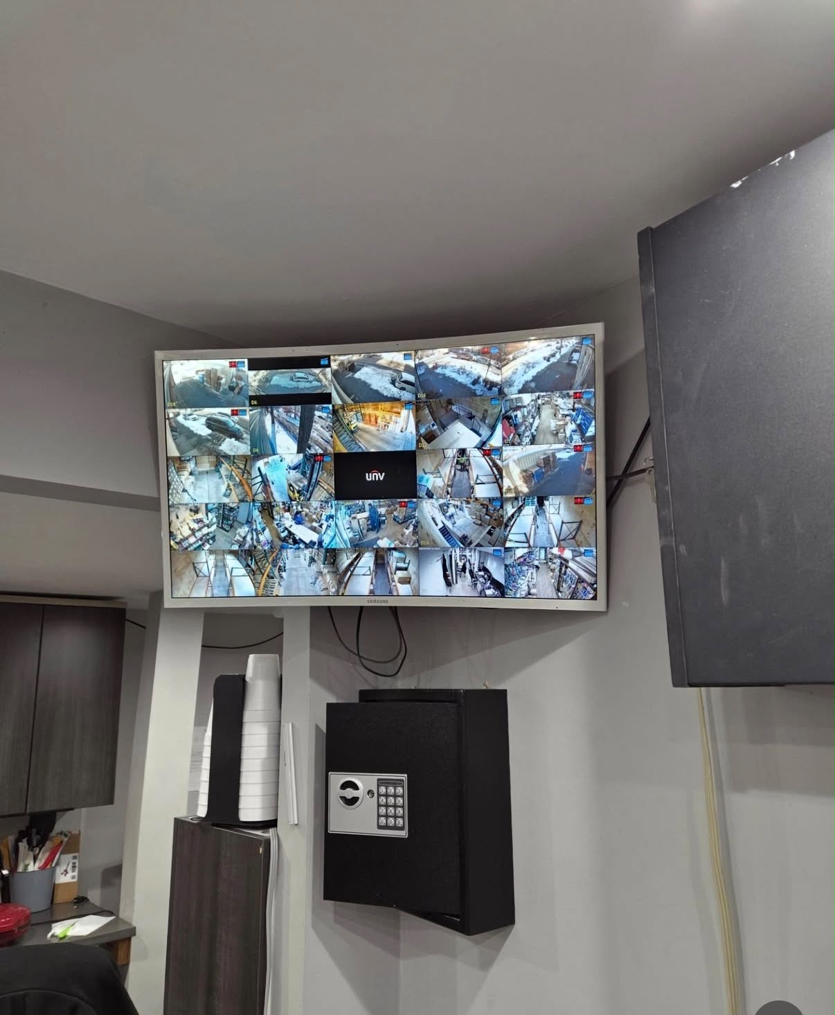 Multi-camera monitor wall installed for a small business